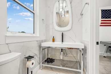 Offered fully furnished, 212 George C. Wallace Boulevard is a - photo 43