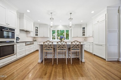 Set on a beautifully landscaped and private 0.51-acre homesite - photo 4
