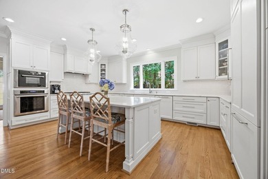 Set on a beautifully landscaped and private 0.51-acre homesite - photo 5