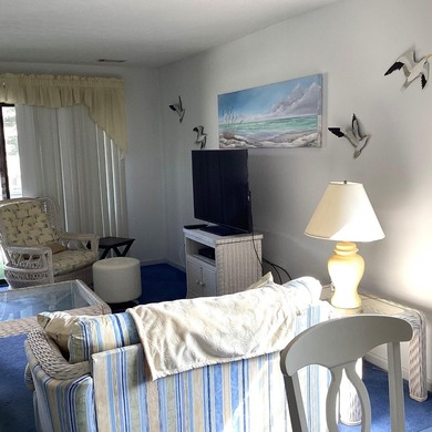 Welcome to this bright and inviting 2-bedroom, 2-bath condo - photo 13