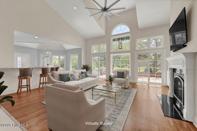 Nestled on a peaceful pond in the gated community of Landfall - photo 4