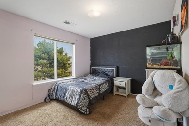 Located in the popular Rancho Sereno subdivision, this welcoming