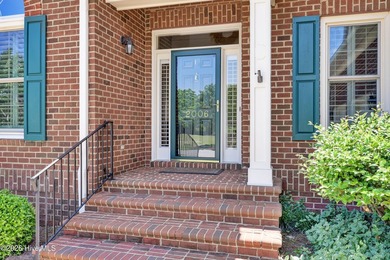 Nestled on a peaceful pond in the gated community of Landfall - photo 7