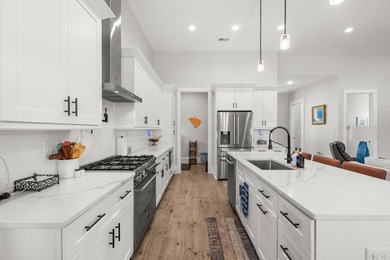 Welcome to 1312 Whooping Crane Drive! Designed for elevated - photo 16