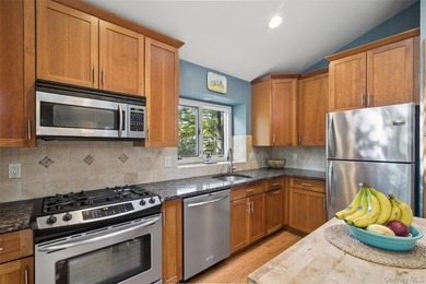 Tucked away among towering trees in the heart of Miller Place - photo 16