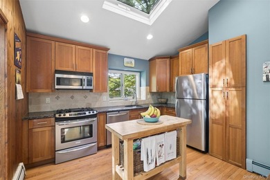Tucked away among towering trees in the heart of Miller Place - photo 17