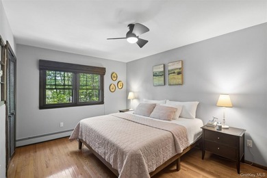 Tucked away among towering trees in the heart of Miller Place - photo 24