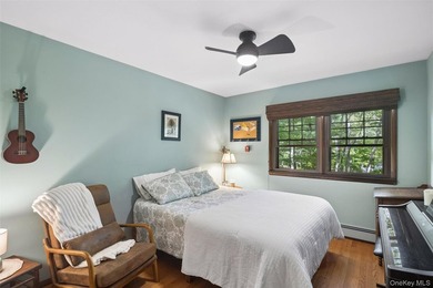 Tucked away among towering trees in the heart of Miller Place - photo 25