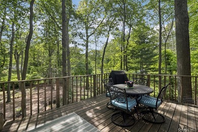 Tucked away among towering trees in the heart of Miller Place - photo 36