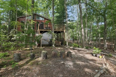 Tucked away among towering trees in the heart of Miller Place - photo 40