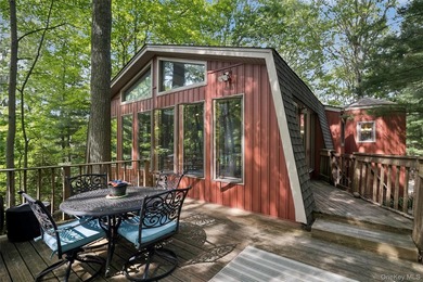 Tucked away among towering trees in the heart of Miller Place - photo 42