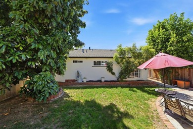 New Lower Price! This must see charming 3 bedroom, one and a - photo 24
