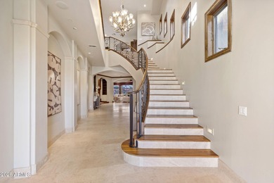 Set within the gated waterfront community of Lake Serena Estates