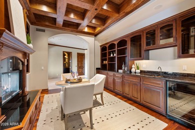 Set within the gated waterfront community of Lake Serena Estates