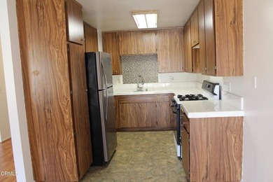 Welcome to this second-level Parkside condominium, offering the - photo 12