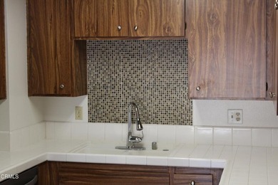 Welcome to this second-level Parkside condominium, offering the - photo 13