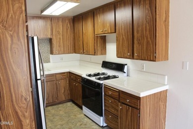 Welcome to this second-level Parkside condominium, offering the - photo 15