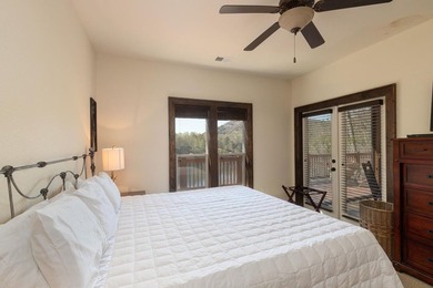 Nestled on a private cove of pristine Bear Creek Lake in the - photo 16