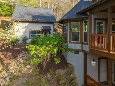 Nestled on a private cove of pristine Bear Creek Lake in the - photo 26