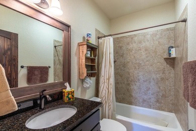 Nestled on a private cove of pristine Bear Creek Lake in the - photo 34