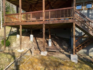 Nestled on a private cove of pristine Bear Creek Lake in the - photo 39