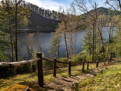 Nestled on a private cove of pristine Bear Creek Lake in the - photo 41