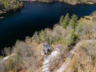 Nestled on a private cove of pristine Bear Creek Lake in the - photo 48