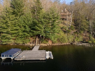 Nestled on a private cove of pristine Bear Creek Lake in the - photo 50