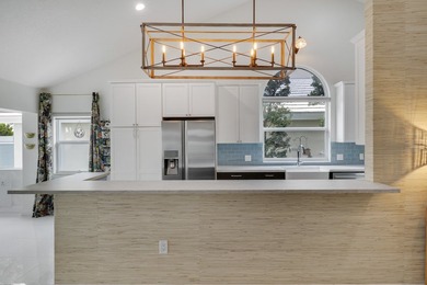 Welcome to this beautifully updated pool home located within the - photo 15