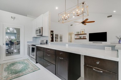 Welcome to this beautifully updated pool home located within the - photo 19