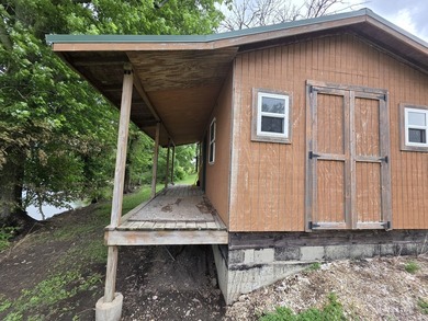 Own a little piece of paradise on the Rock River. This 1400 Sq - photo 8