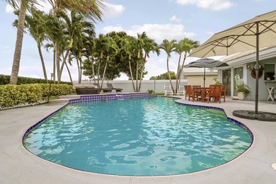 Welcome to this beautifully updated pool home located within the - photo 41