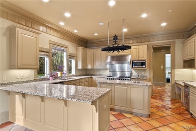 This stunning home is located North of the River in the very