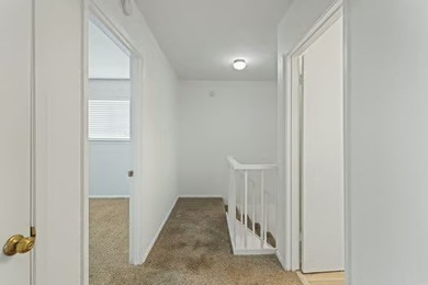 Welcome to Lakewood Village! This charming end-unit condo offers - photo 11