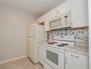 Enjoy stunning lake and golf course views in this 1,188 sq ft - photo 11