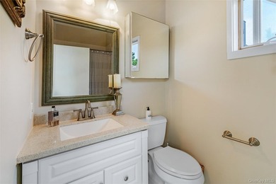 Set on 0.69 acres, bordering a two-acre dune preserve, this - photo 12