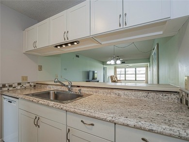 Enjoy stunning lake and golf course views in this 1,188 sq ft - photo 12