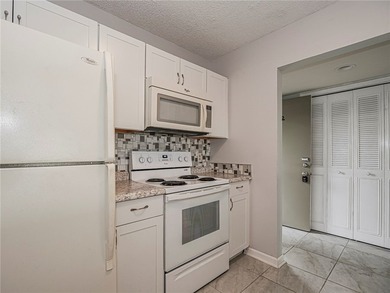 Enjoy stunning lake and golf course views in this 1,188 sq ft - photo 13