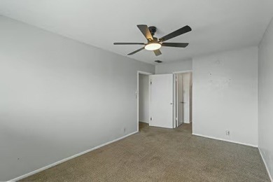Welcome to Lakewood Village! This charming end-unit condo offers - photo 14