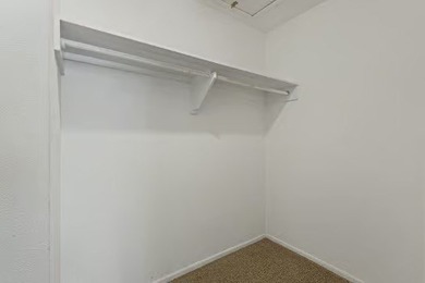 Welcome to Lakewood Village! This charming end-unit condo offers - photo 15