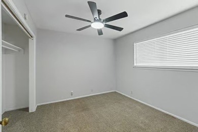 Welcome to Lakewood Village! This charming end-unit condo offers - photo 16