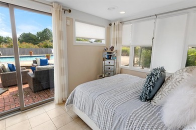 Set on 0.69 acres, bordering a two-acre dune preserve, this - photo 17