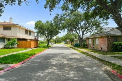 Welcome to Lakewood Village! This charming end-unit condo offers - photo 21
