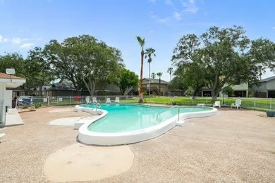 Welcome to Lakewood Village! This charming end-unit condo offers - photo 23