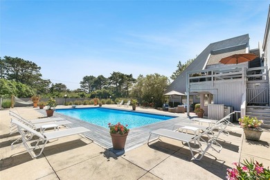 Set on 0.69 acres, bordering a two-acre dune preserve, this - photo 24