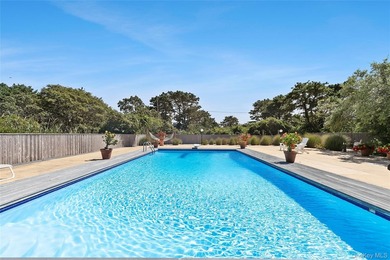 Set on 0.69 acres, bordering a two-acre dune preserve, this - photo 25