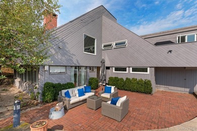 Set on 0.69 acres, bordering a two-acre dune preserve, this - photo 28