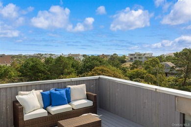 Set on 0.69 acres, bordering a two-acre dune preserve, this - photo 32