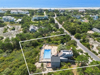 Set on 0.69 acres, bordering a two-acre dune preserve, this - photo 36