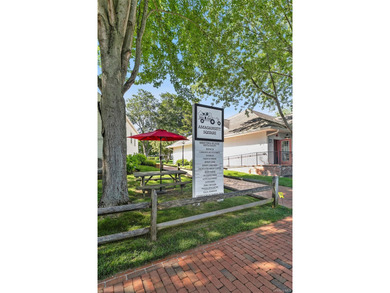 Set on 0.69 acres, bordering a two-acre dune preserve, this - photo 38